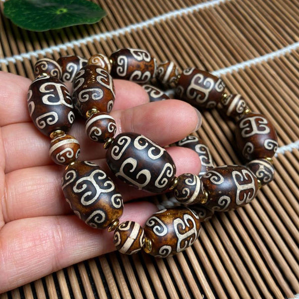 Tibetan Curved Ruyi Pattern Dzi Beads Bracelet, Amulet for Happiness and Increases Access to Good Luck.